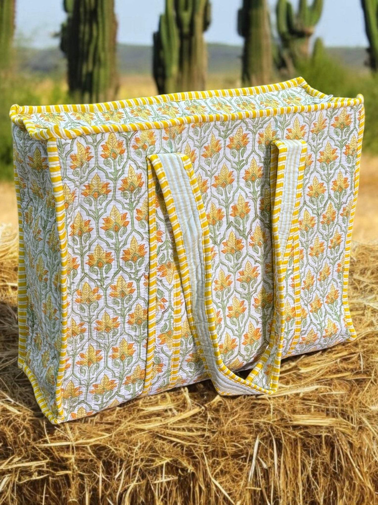 Handcrafted party return gift tote bags for women with zip and side bottle pouch in UAE and India