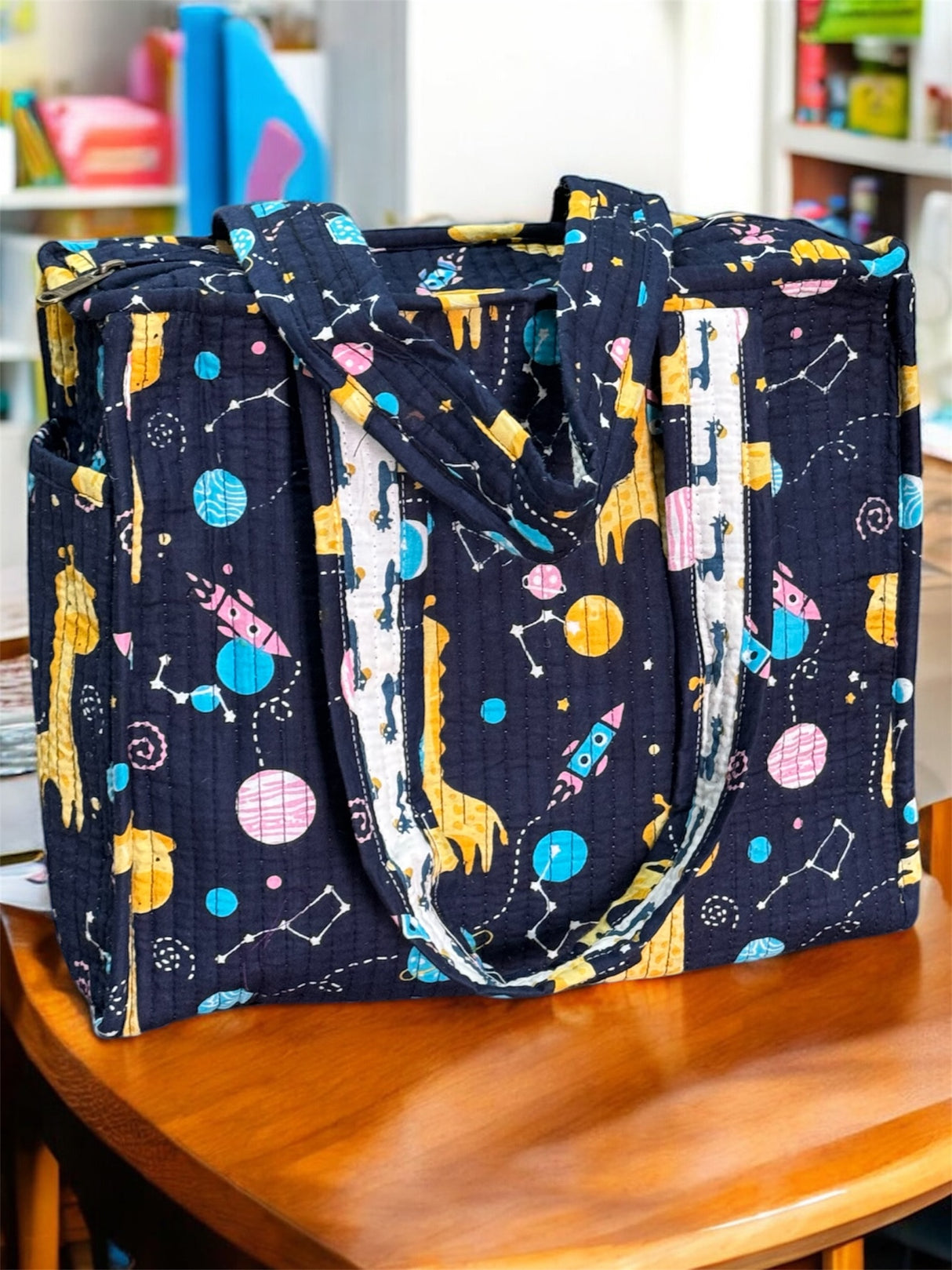 Spacious cotton tote bag with blue giraffe design for gifting toddlers and mothers as birthday return gifts in UK and Singapore