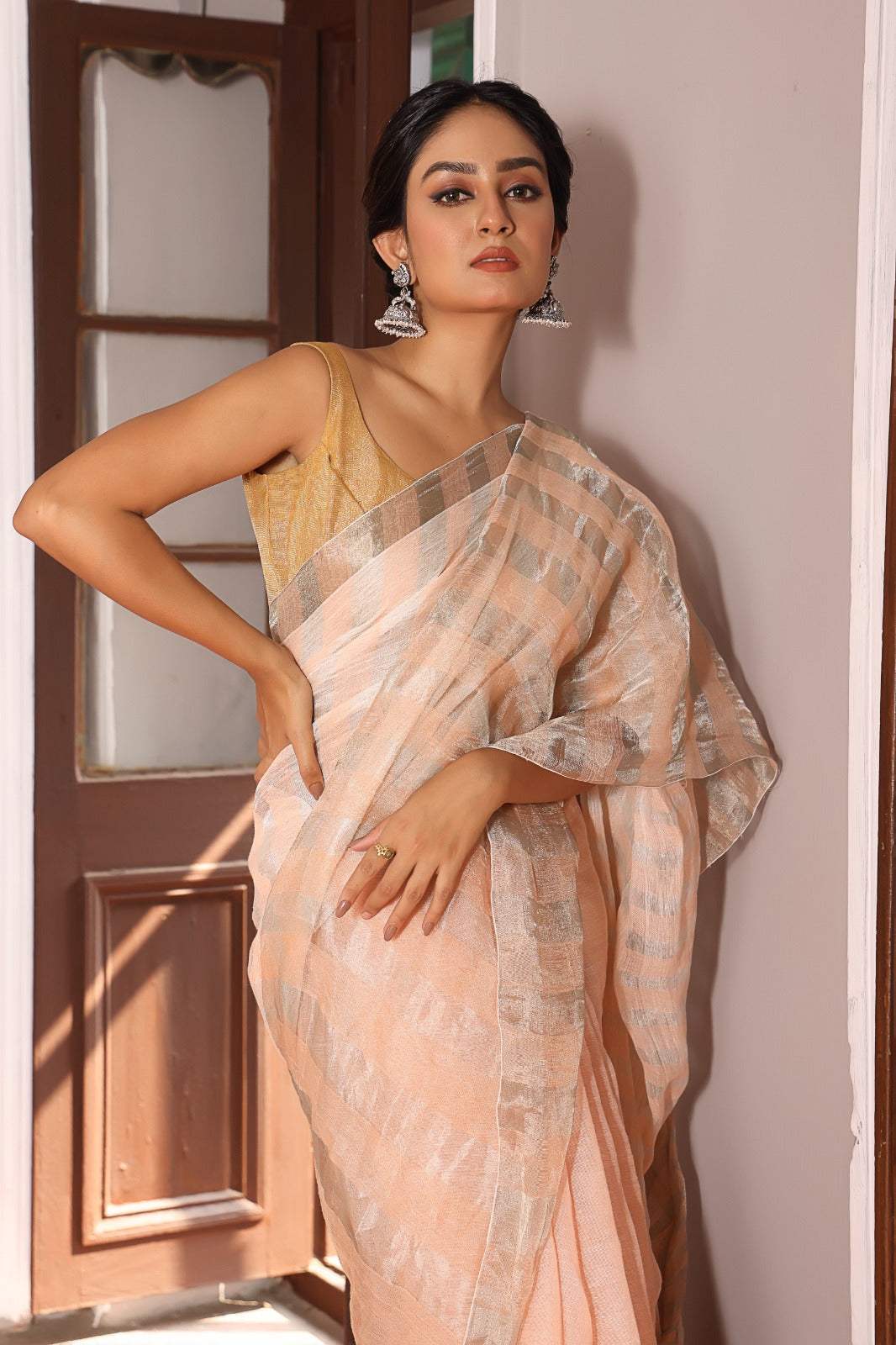 Elegant Peach Handloom Tissue Linen Saree