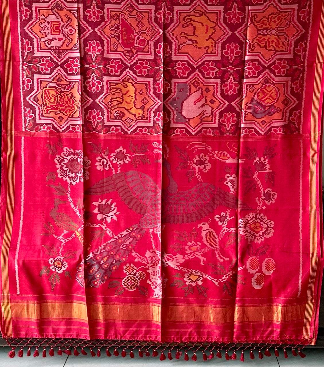 Sophisticated Handloom Brown and Red Mulberry Silk Ikat Patola Saree with Animal Motifs
