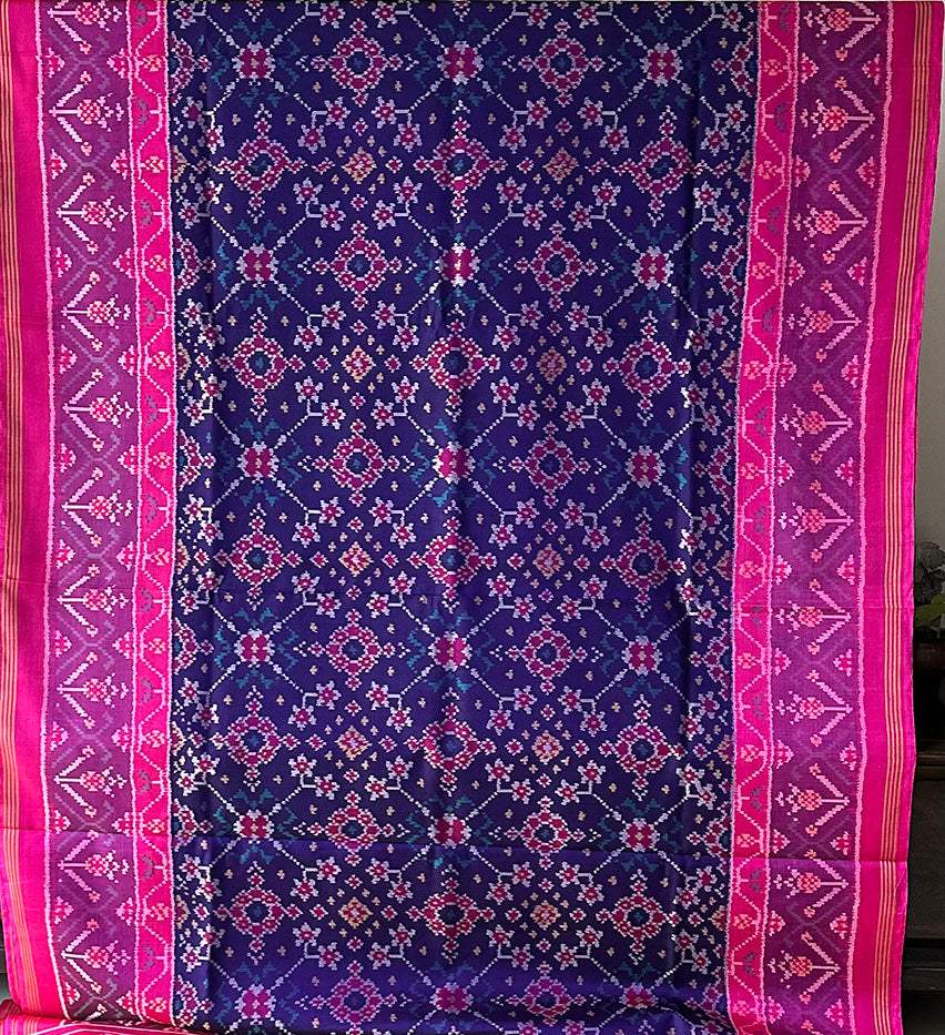 Exquisite Handloom Violet and Pink Mulberry Silk Ikat Patola Saree with Intricate Navratna Motif