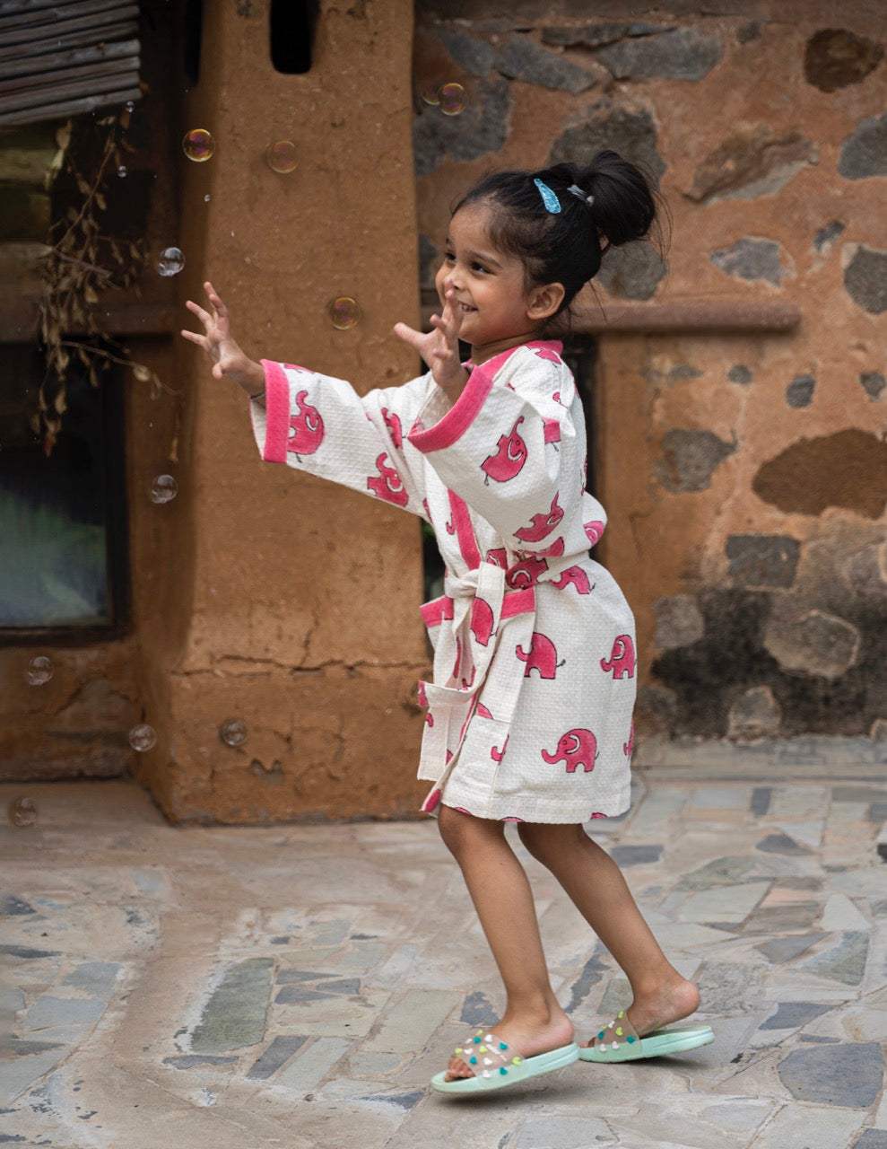 export ready block printed cotton bathrobe for kids with elephant motif and name personalization for boutique resellers in Thailand and Israel