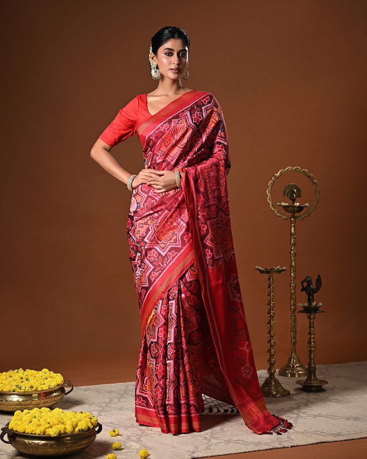 Sophisticated Handloom Brown and Red Mulberry Silk Ikat Patola Saree with Animal Motifs