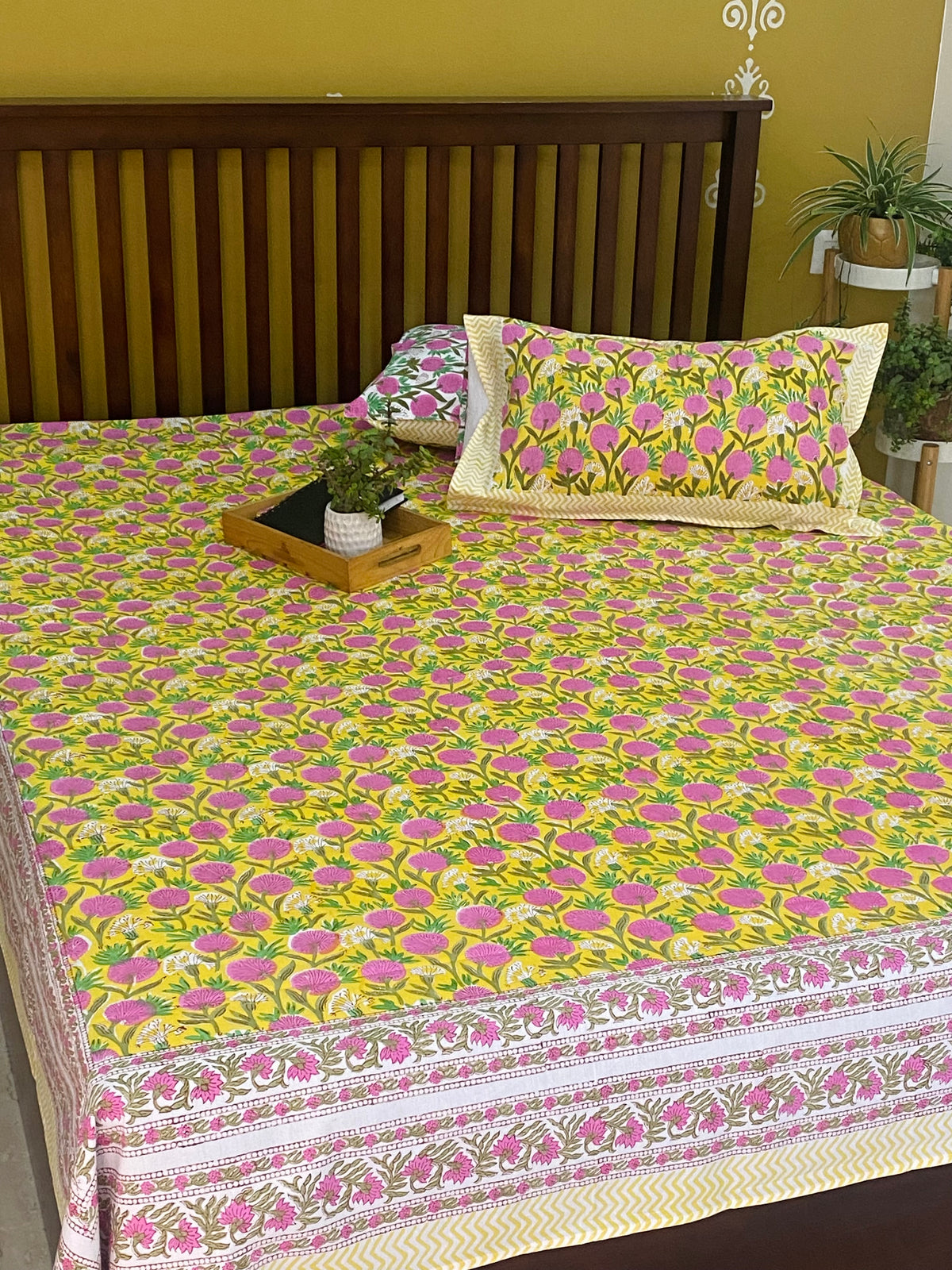 Yellow cotton bedsheet with pink floral print