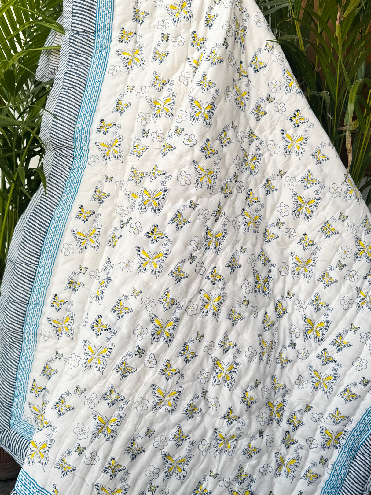 block-printed-reversible-baby-quilt-with-butterfly-motifs-on-both-sides-handmade-in-jaipur