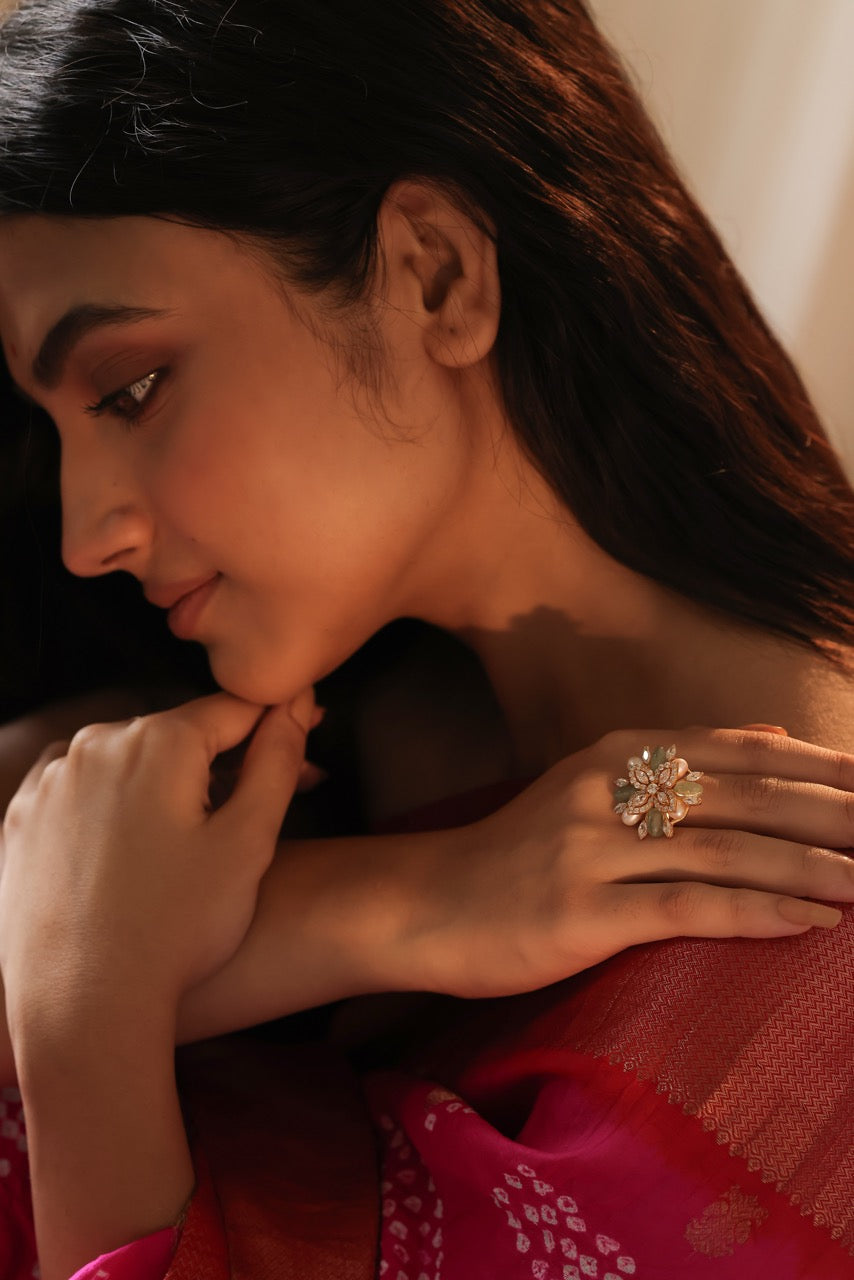 Woman wearing a pink saree with a 92.5 silver ring