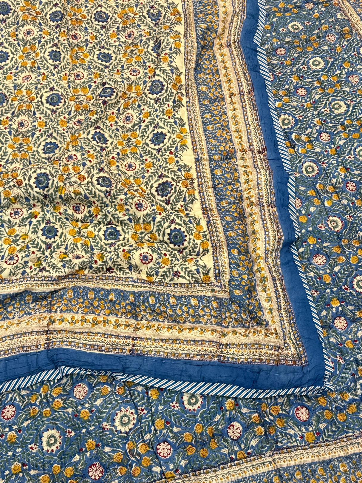 cotton-filled-hand-stitched-quilt