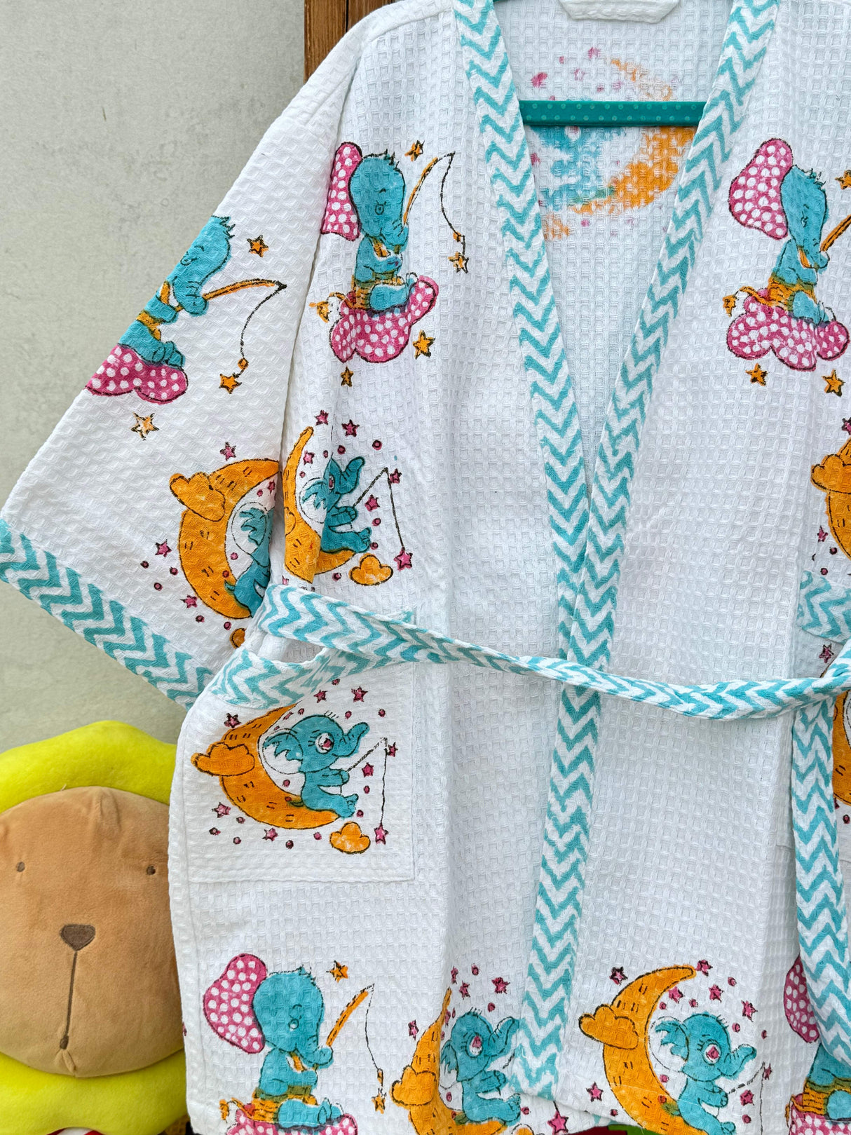 block printed cotton kids bathrobe with elephant design and name customization in waffle fabric for bulk orders and reselling