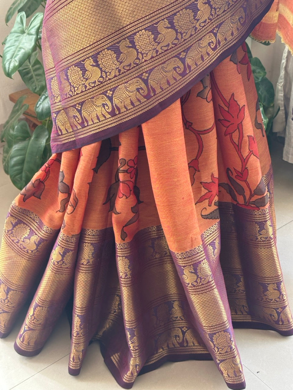 dull-orange-floral-cotton-kalamkari-saree-front-drape-view