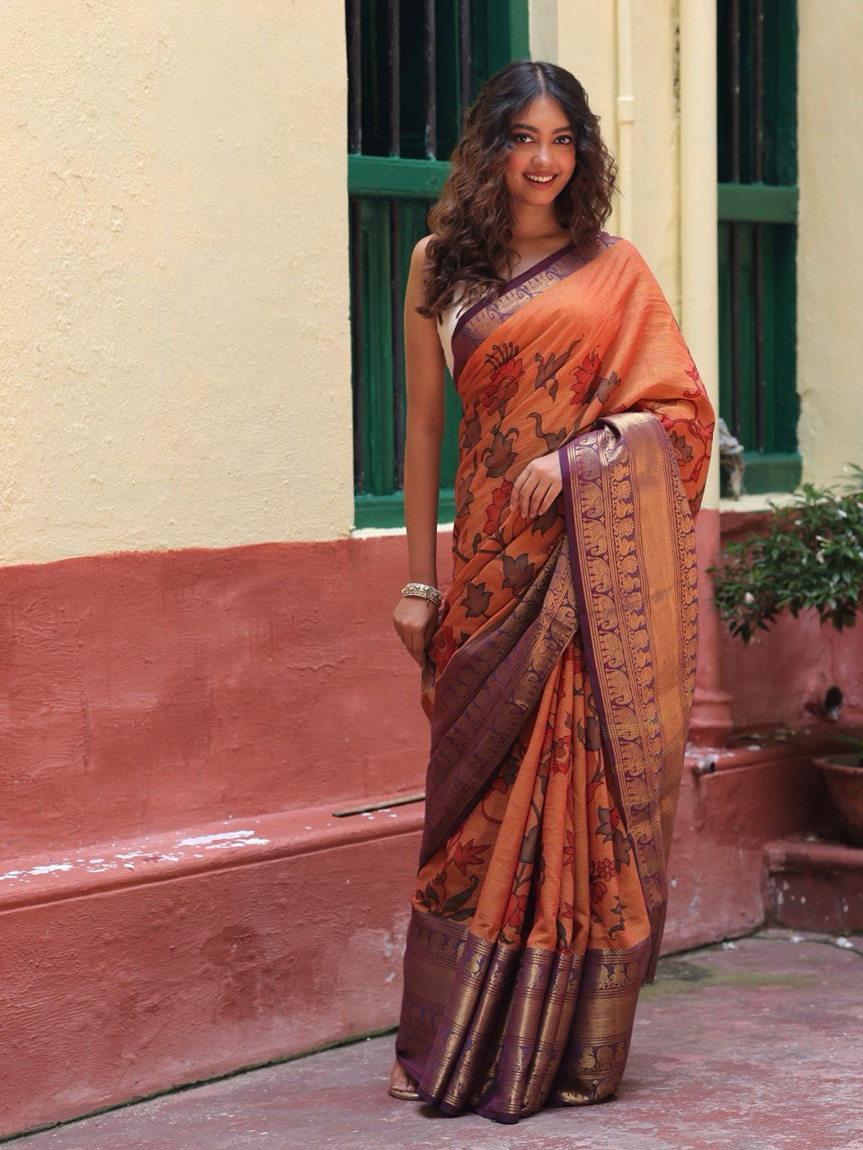 dull-orange-floral-cotton-kalamkari-saree-full-view-on-model