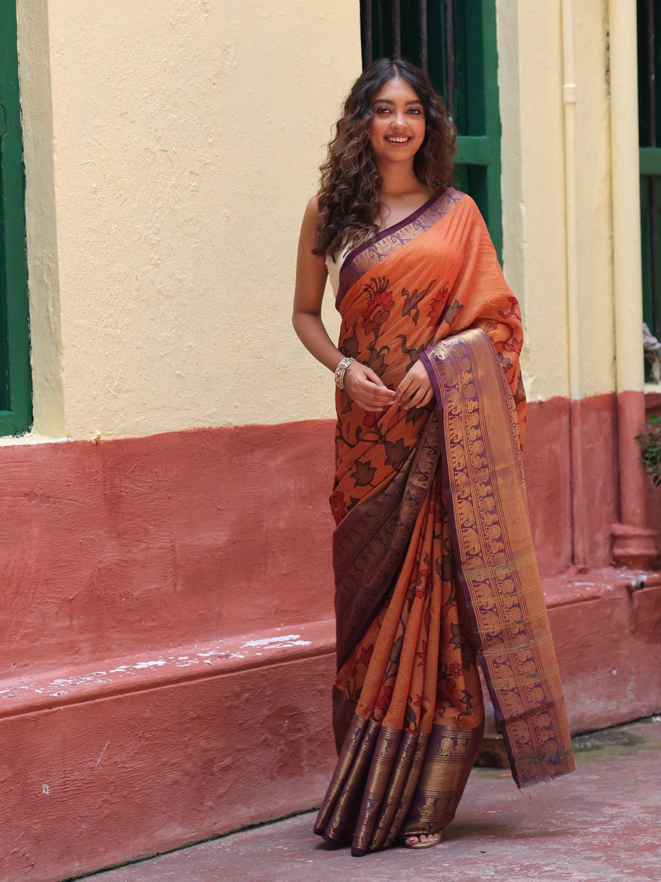 dull-orange-floral-cotton-kalamkari-saree-styled-look-front-angle