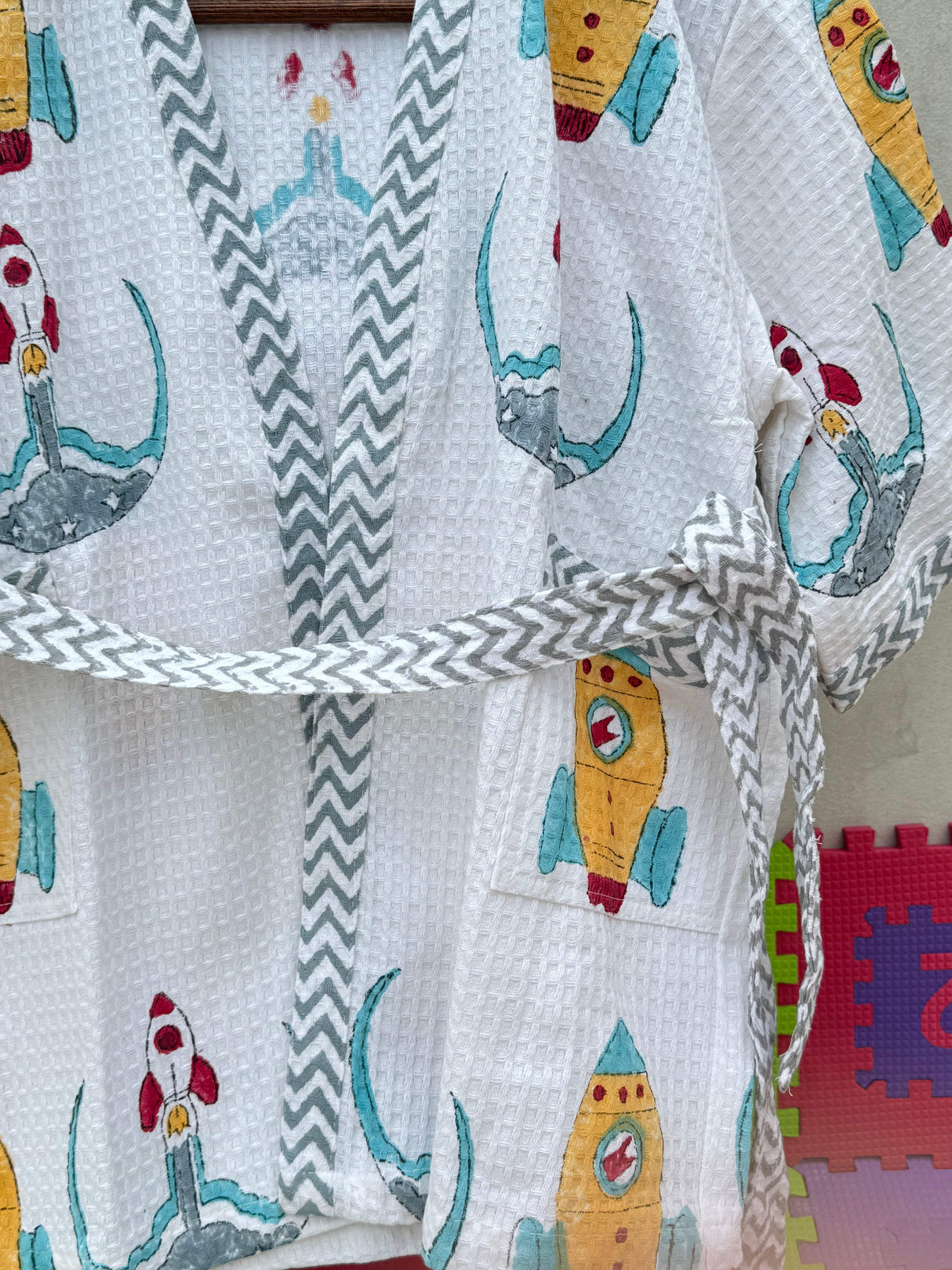space rocket themed kids bathrobe in breathable waffle cotton