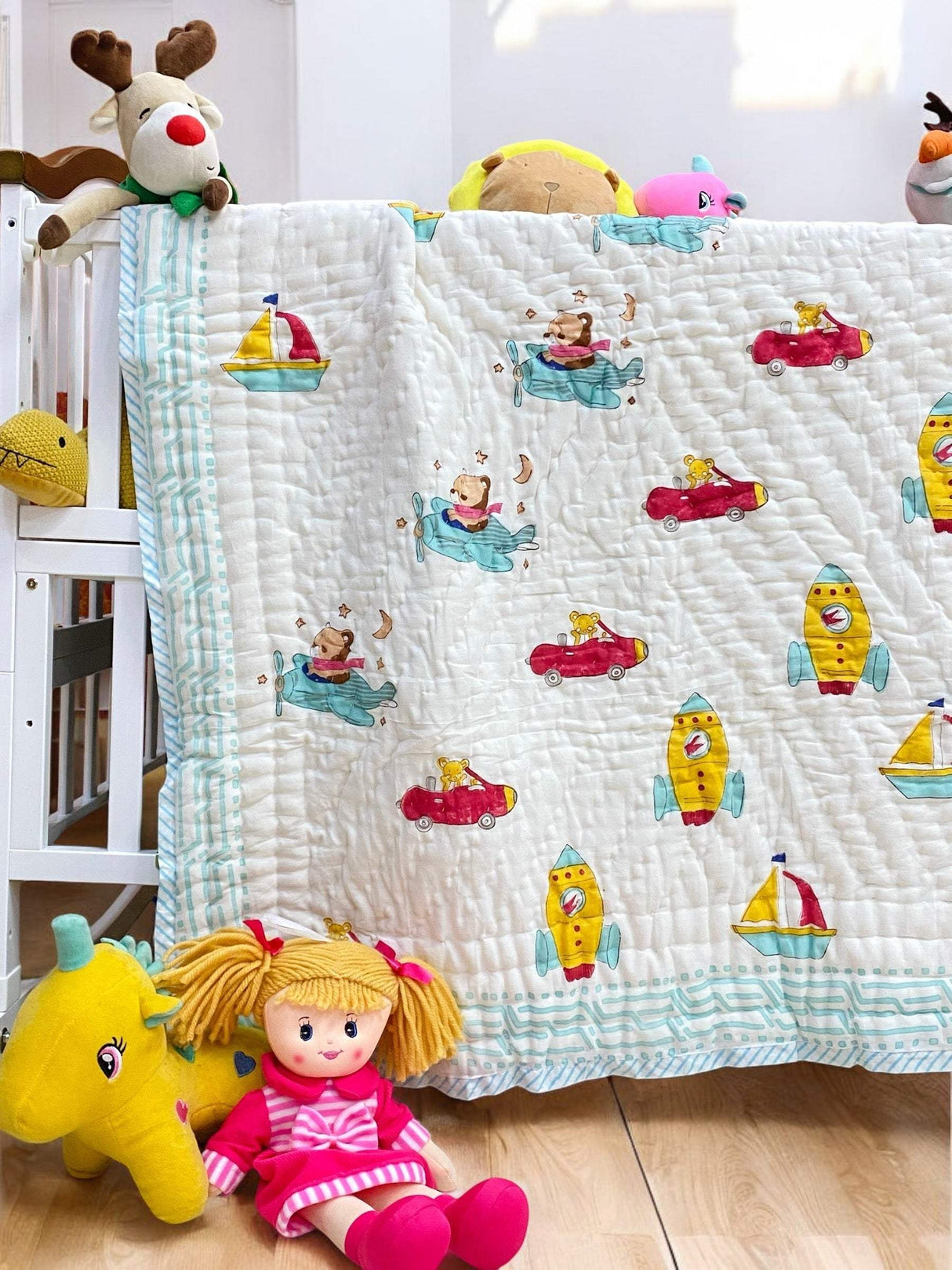 soft cotton toddler quilt with cars and rockets motif made in Jaipur India for wholesale and retail export