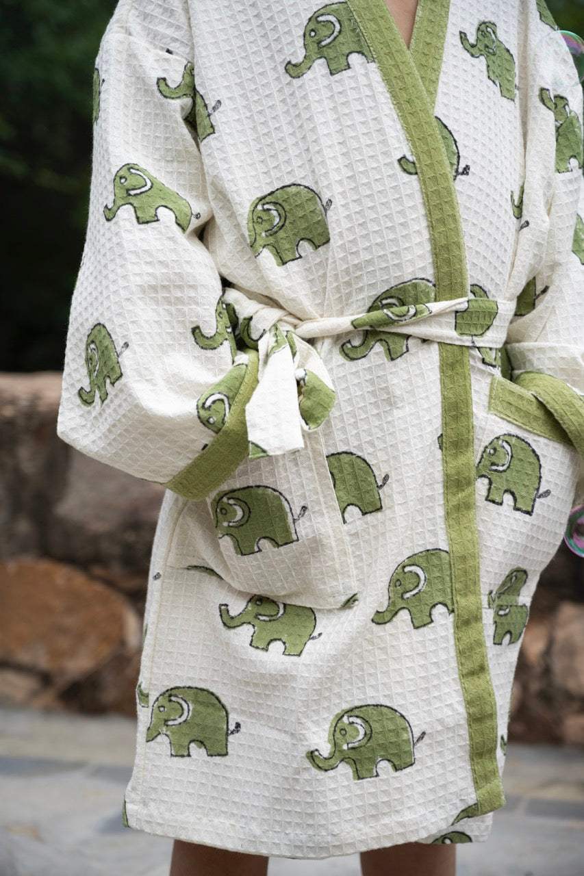 lightweight waffle cotton kids bathrobe with name customization and elephant design shipped to boutique resellers in Portugal and Saudi Arabia
