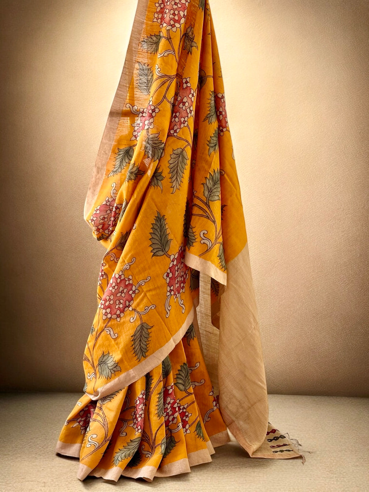 Handloom Matka Silk Floral Kalamkari Saree In Kesari Colour (PREORDER 1 month)