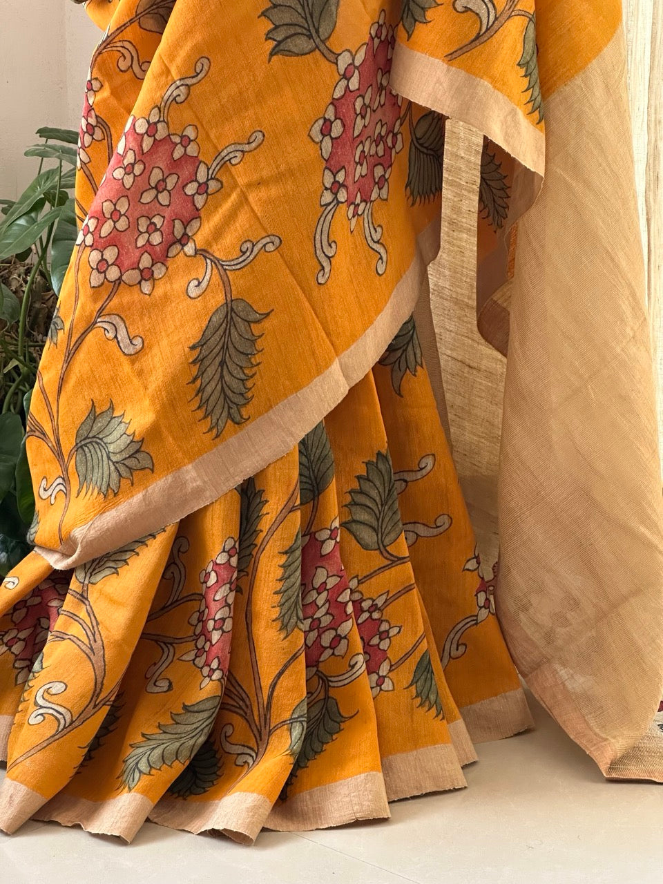 Handloom Matka Silk Floral Kalamkari Saree In Kesari Colour (PREORDER 1 month)