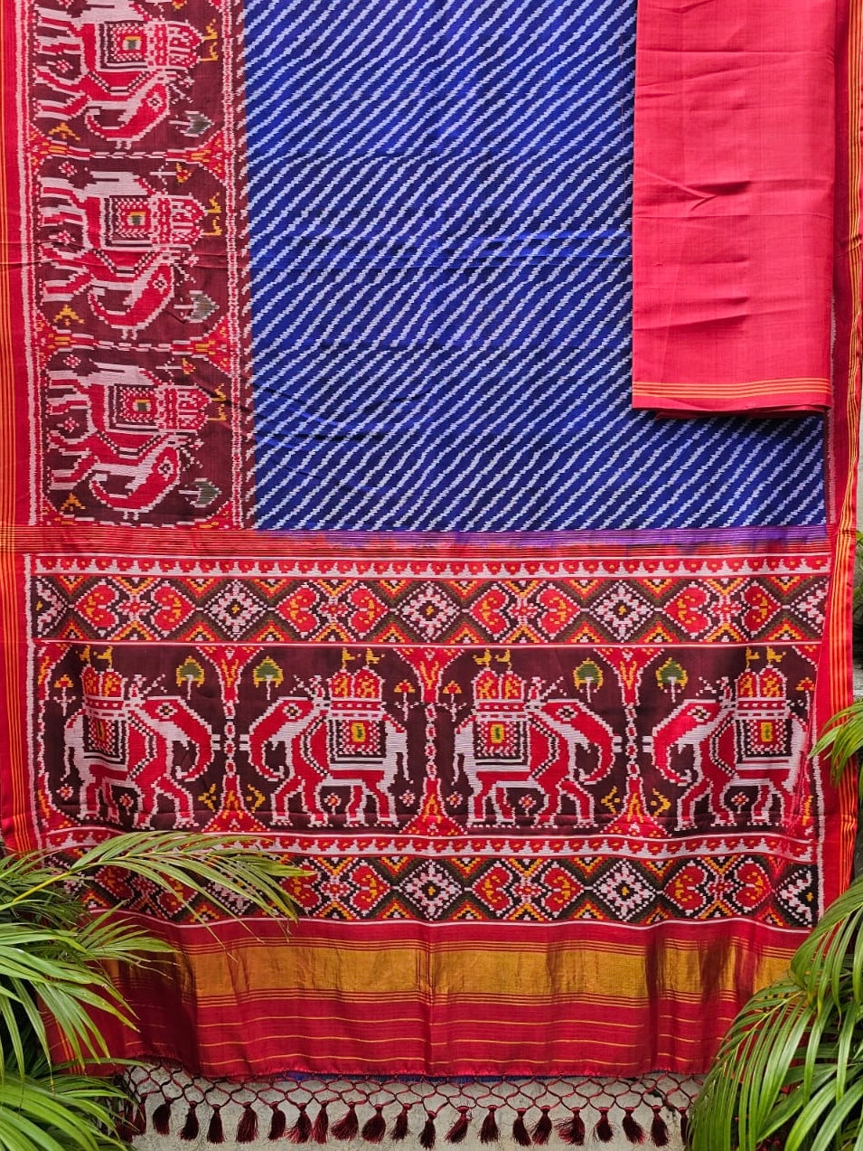 Exclusive Handloom Blue and Red Mulberry Silk Ikat Patola Saree with Leheriya and Gajraj Motifs