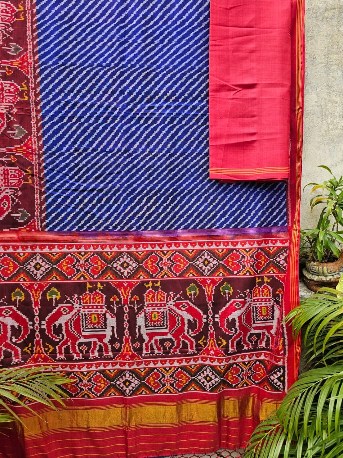 Exclusive Handloom Blue and Red Mulberry Silk Ikat Patola Saree with Leheriya and Gajraj Motifs