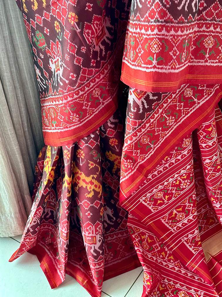 Graceful Handloom Brown and Red Mulberry Silk Ikat Patola Saree with Tiger and Elephant Motifs
