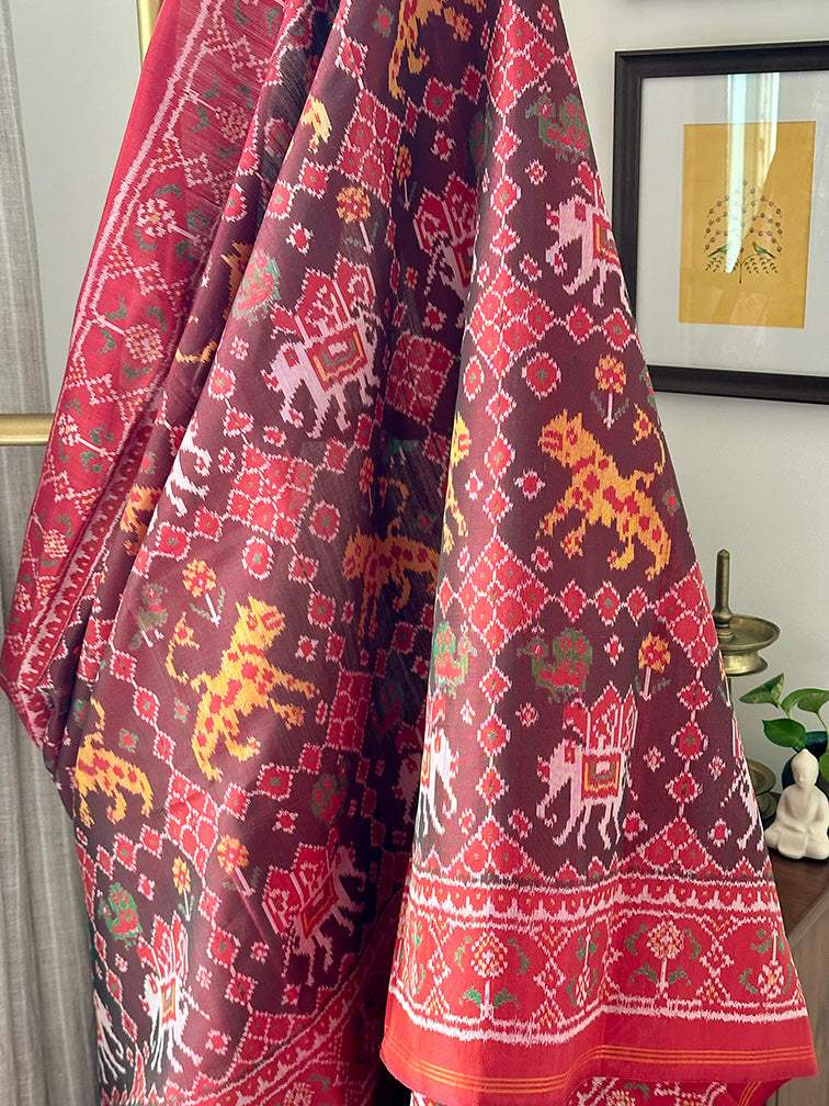 Graceful Handloom Brown and Red Mulberry Silk Ikat Patola Saree with Tiger and Elephant Motifs