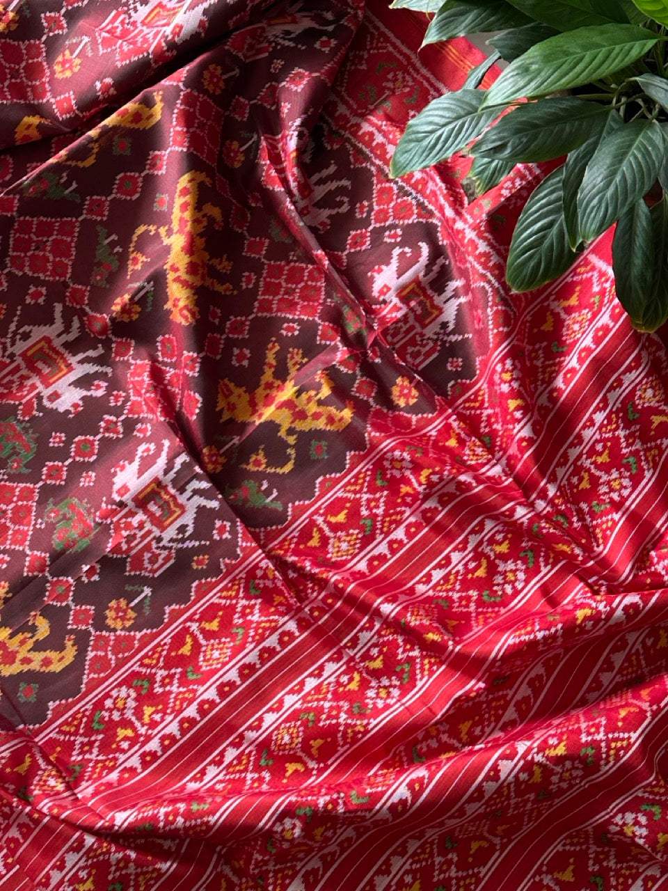 Graceful Handloom Brown and Red Mulberry Silk Ikat Patola Saree with Tiger and Elephant Motifs