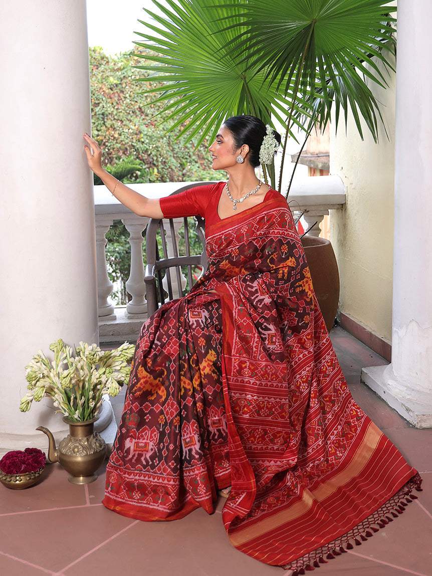 Graceful Handloom Brown and Red Mulberry Silk Ikat Patola Saree with Tiger and Elephant Motifs