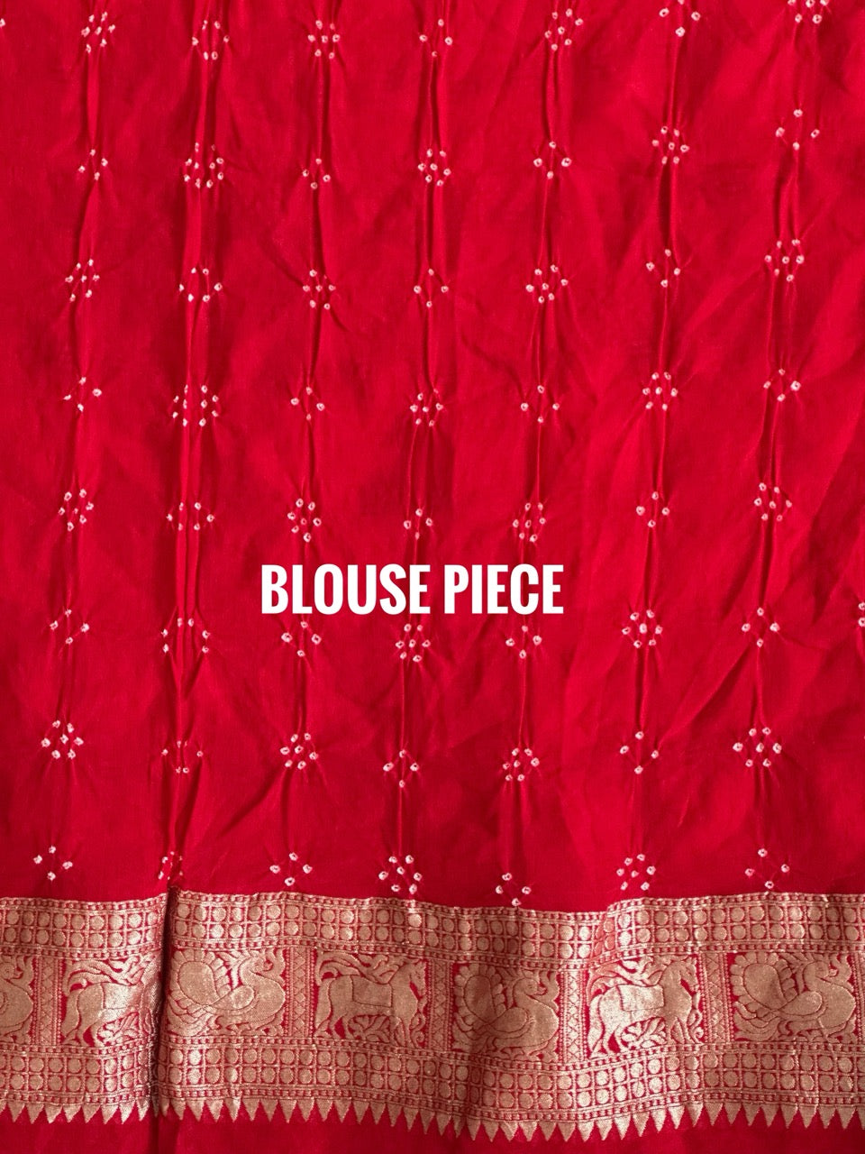 Buy pure Banarasi georgette Bandhani saree in vermilion red with gold zari elephant motifs & rich woven pallu. Authentic handloom luxury online at Kapaas Katha.