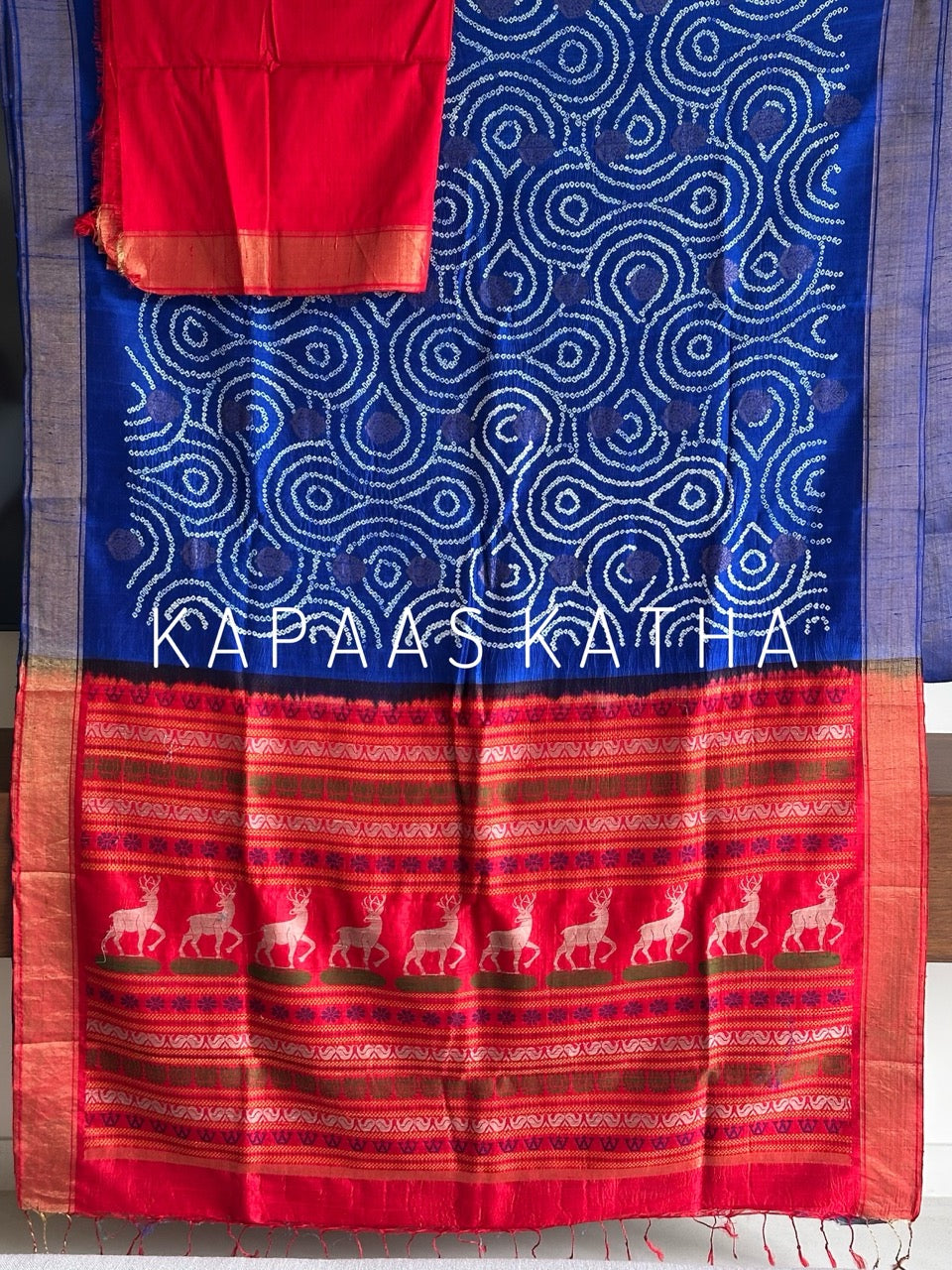 Munga Silk Bandhani Saree, Pure Silk Blue Bandhani Saree, Contrast Deer Motif Zari Pallu Saree, Kapaas Katha Designer Sarees, Hand-Tied Munga Silk Sarees Online