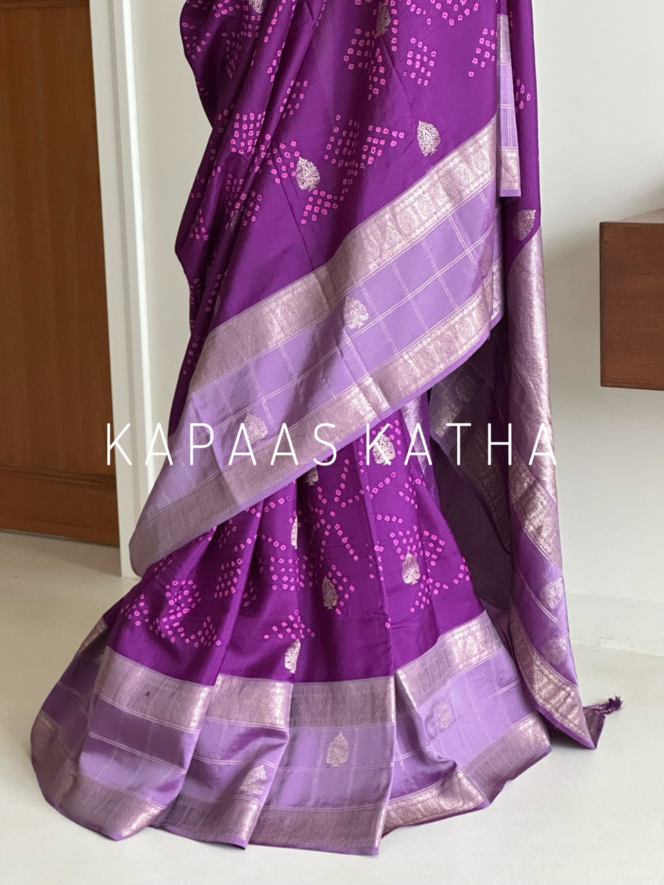 Buy pure Vasundhara silk Bandhani saree in royal magenta purple with gold zari leaf motifs & silver zari border. Authentic handwoven luxury online at Kapaas Katha.