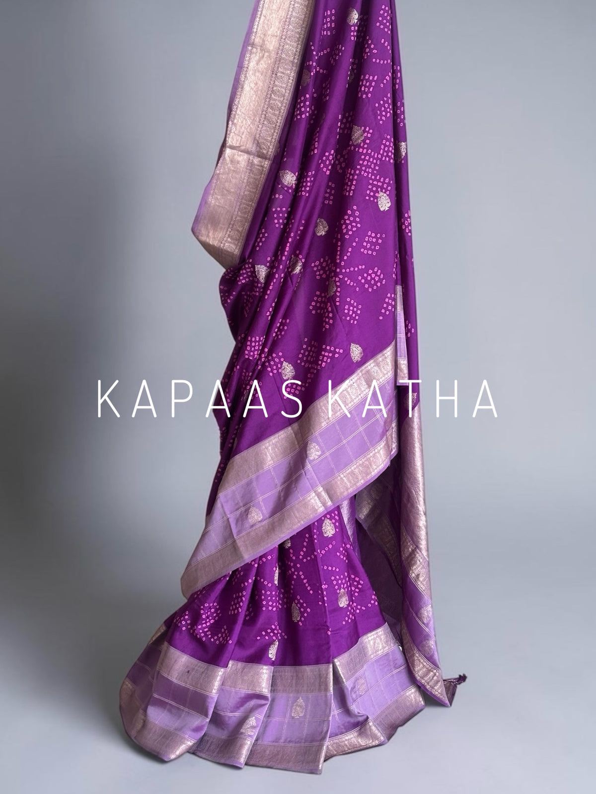 Buy pure Vasundhara silk Bandhani saree in royal magenta purple with gold zari leaf motifs & silver zari border. Authentic handwoven luxury online at Kapaas Katha.