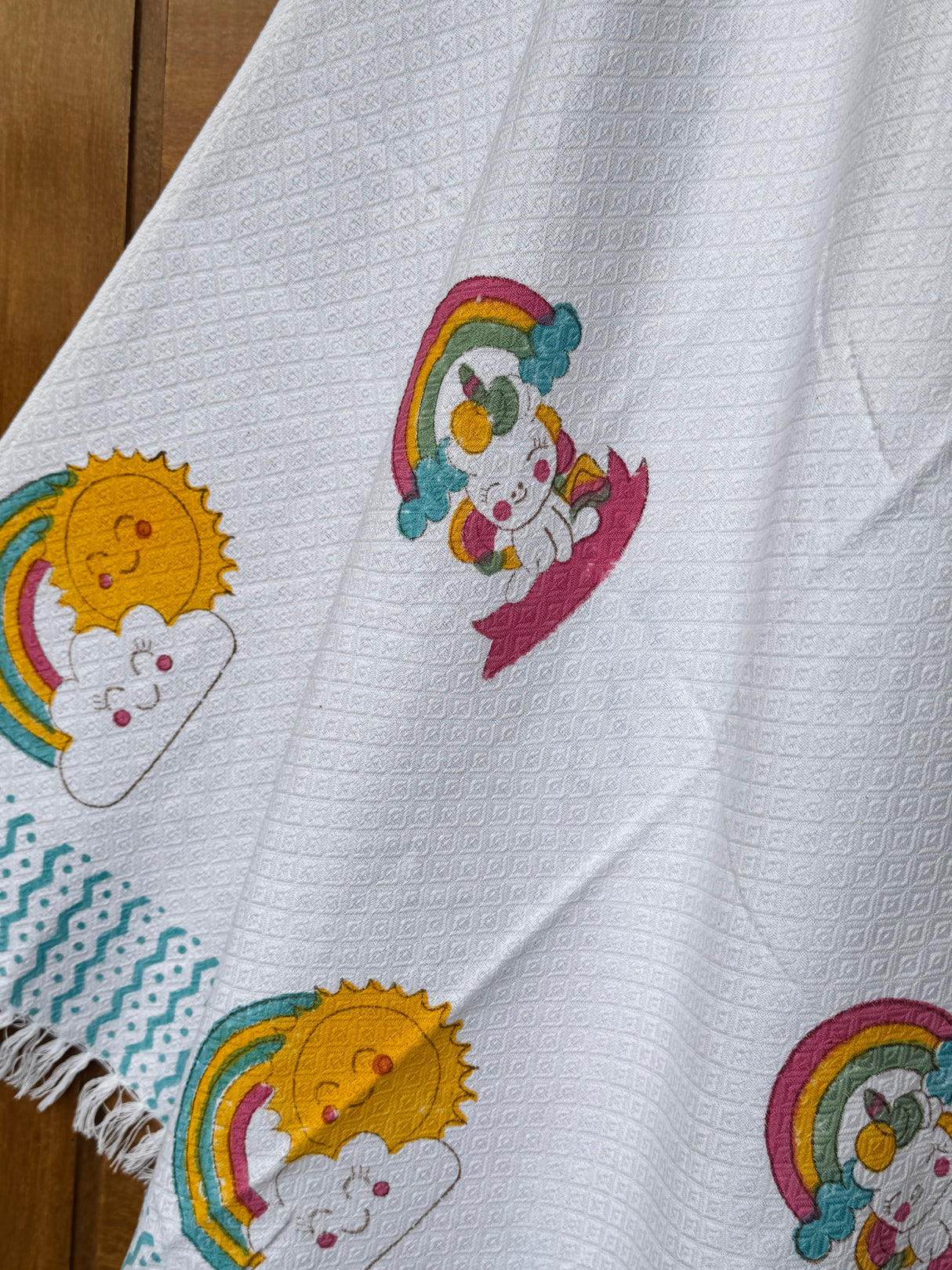 kids-towel-with-playful-rainbow-and-cloud-art