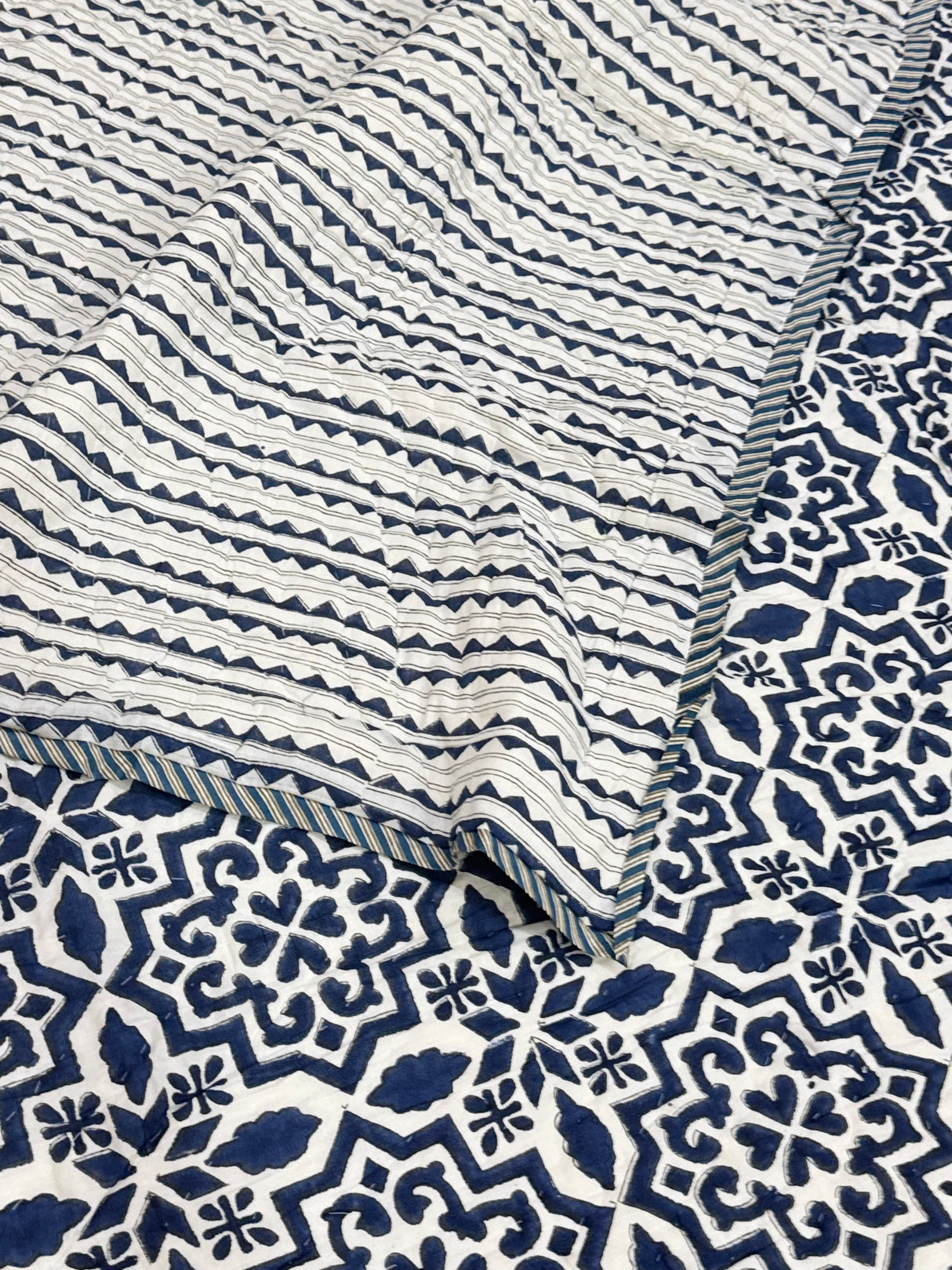 lightweight-reversible-quilt-with-geometric-motifs