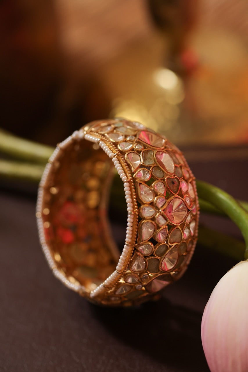 Woman in a pink saree wearing 92.5 silver statement kada