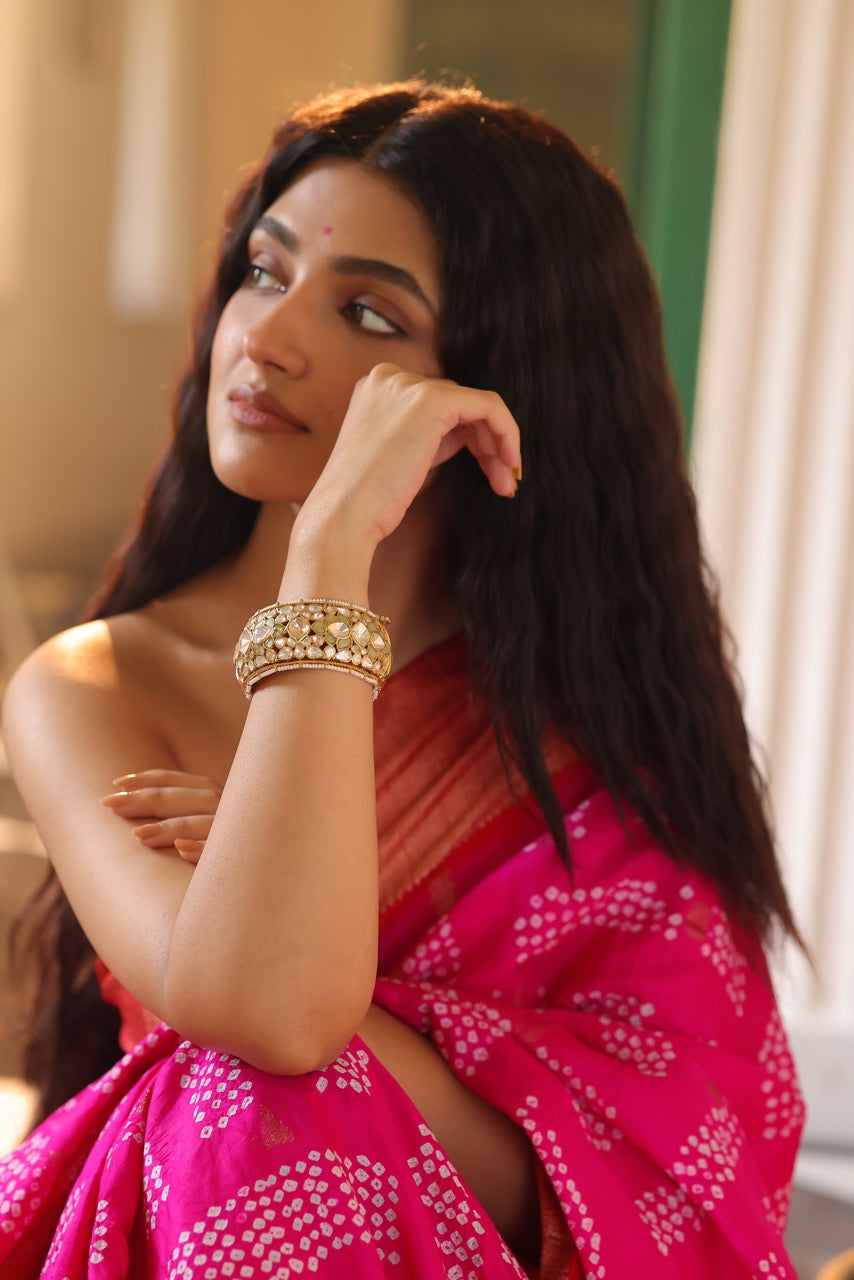 Woman in a pink saree wearing 92.5 silver statement kada