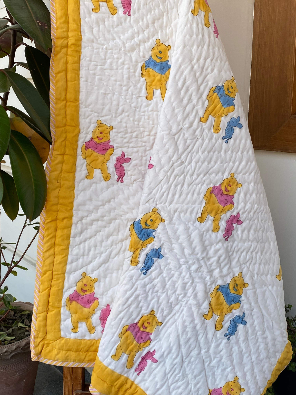 premium-handblock-print-kids-quilt-with-pink-blue-pooh-design-suitable-for-small-businesses-worldwide