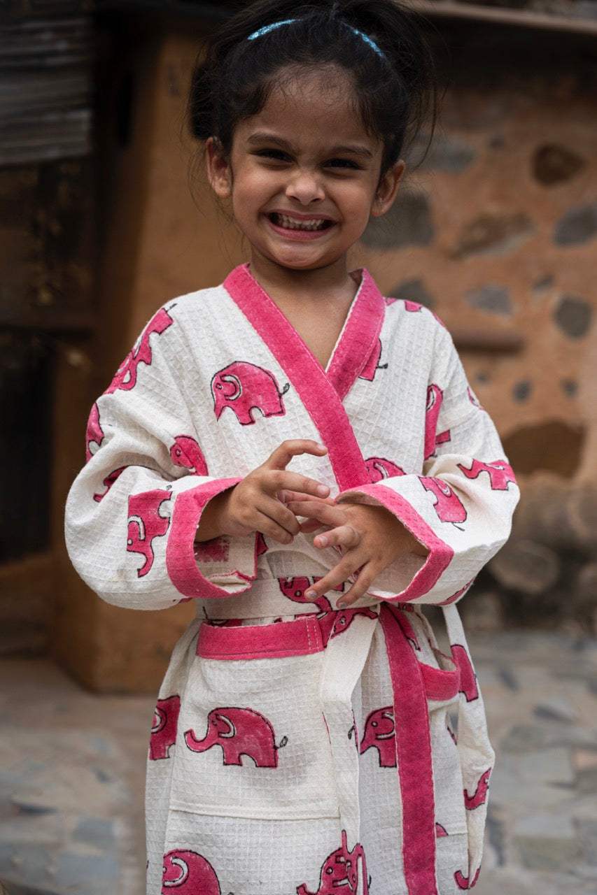 cotton waffle kids bathrobe with light elephant design and embroidered name available in bulk for Mexico and Finland resellers
