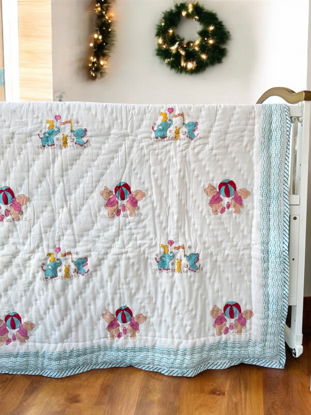 lightweight breathable baby quilt in mulmul with teddy bears and elephants suitable for toddler gifting in UK and New Zealand