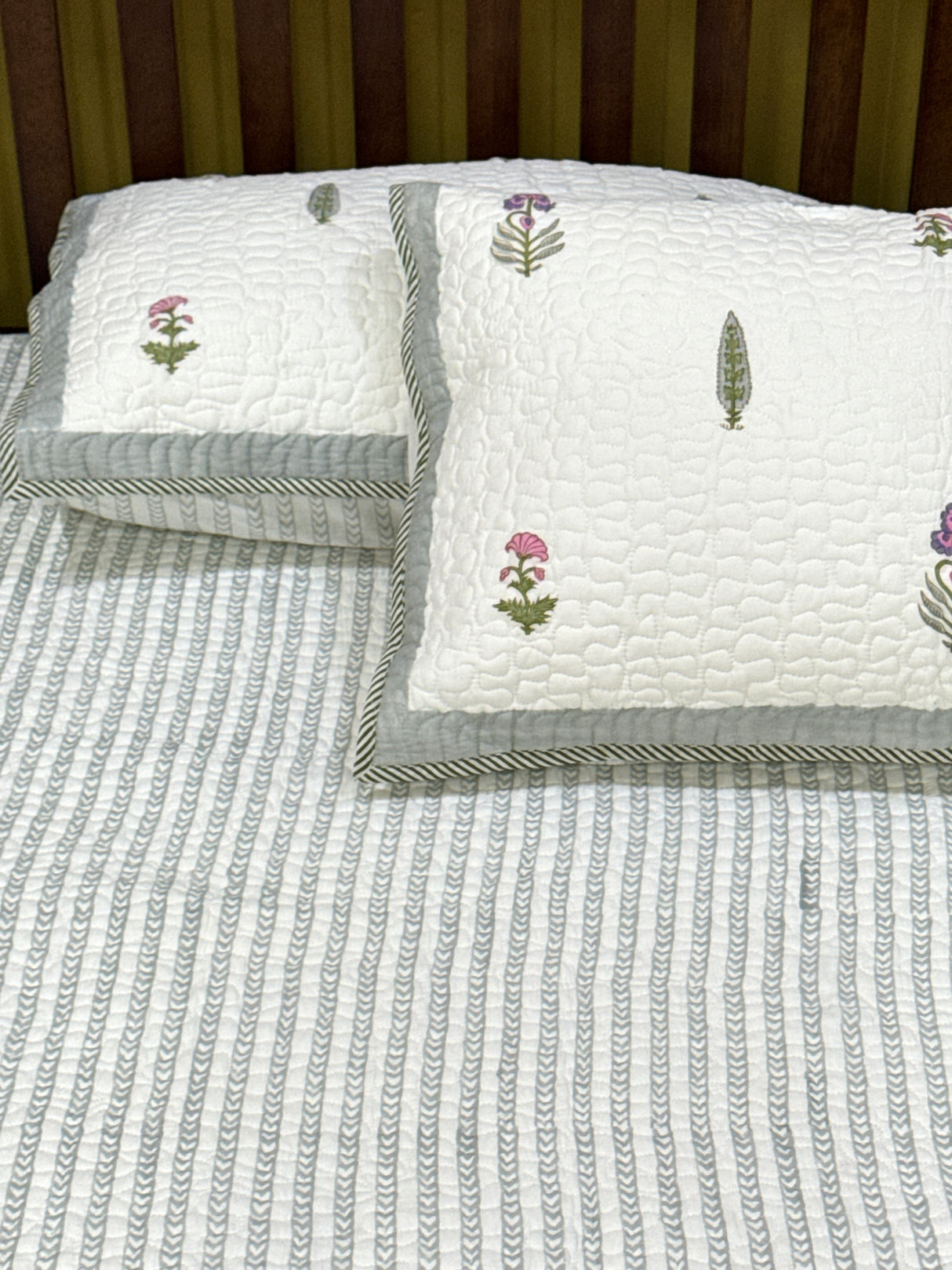 quilted-floral-bedcover-styled-on-bed