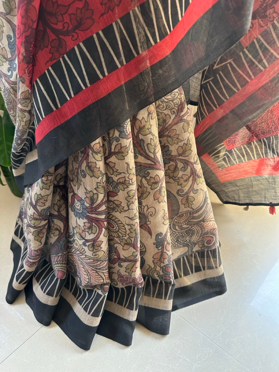 red-beige-half-and-half-linen-cotton-kalamkari-saree-drape-close-up