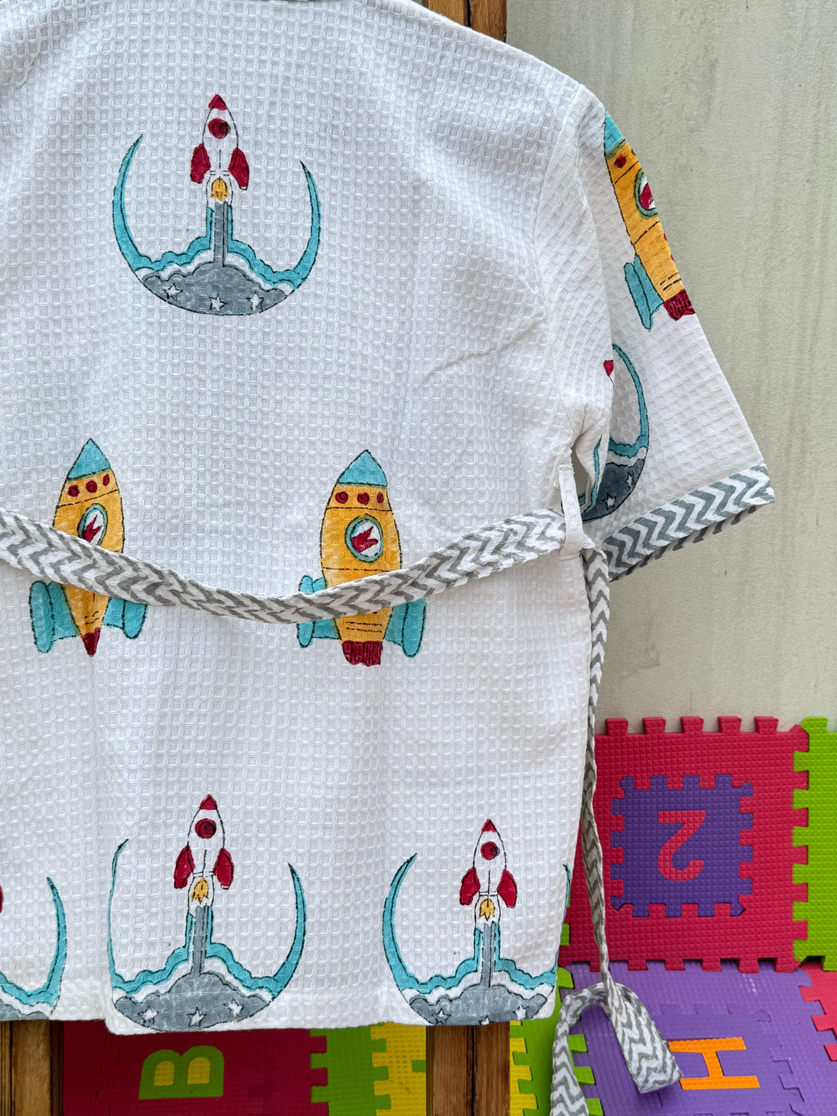 personalized cotton waffle bathrobe for kids with rocket print for boutique resellers in australia usa singapore and india