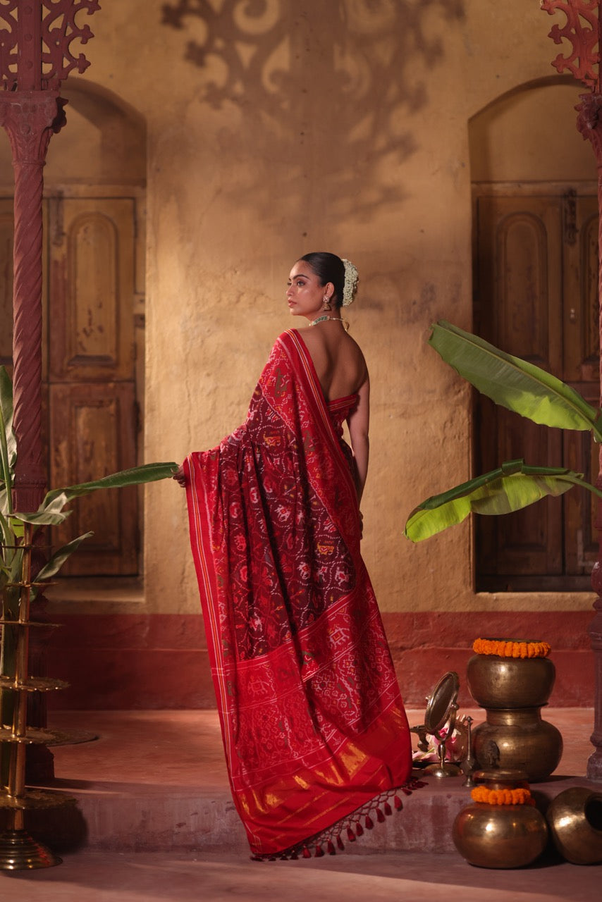 sophisticated-handloom-brown-and-red-mulberry-silk-ikat-patola-saree-with-animal-motifs