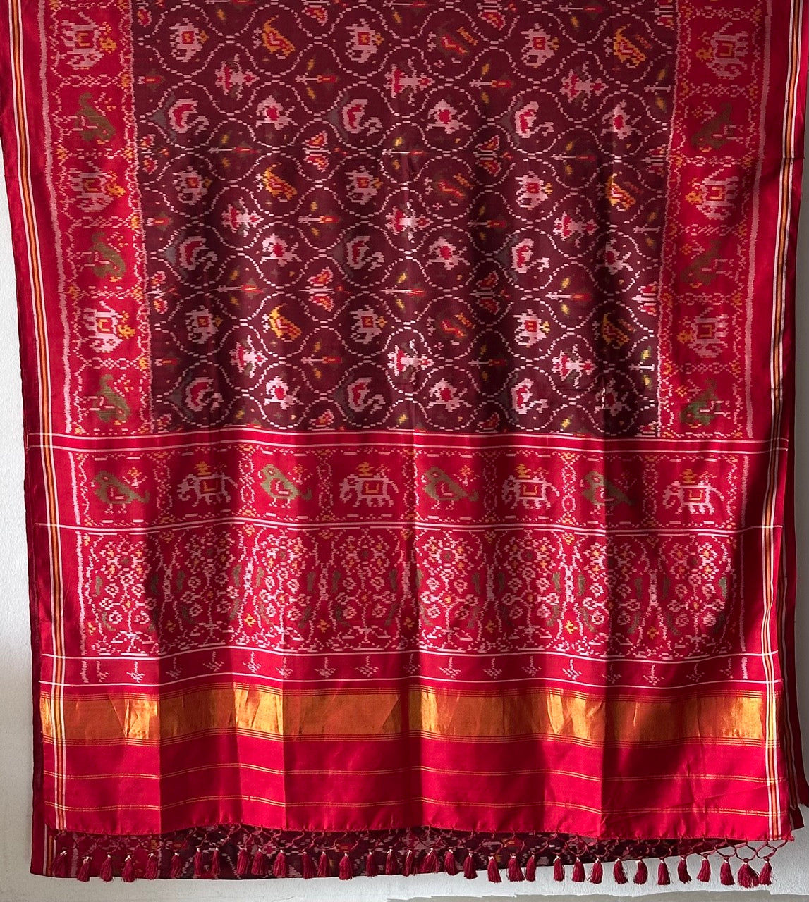 sophisticated-handloom-brown-and-red-mulberry-silk-ikat-patola-saree-with-animal-motifs
