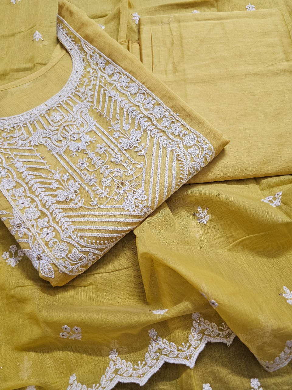 Sophisticated Yellow Floral Machine Embroidered Three Piece Chanderi Mulmul Semi Stitched Suit Set