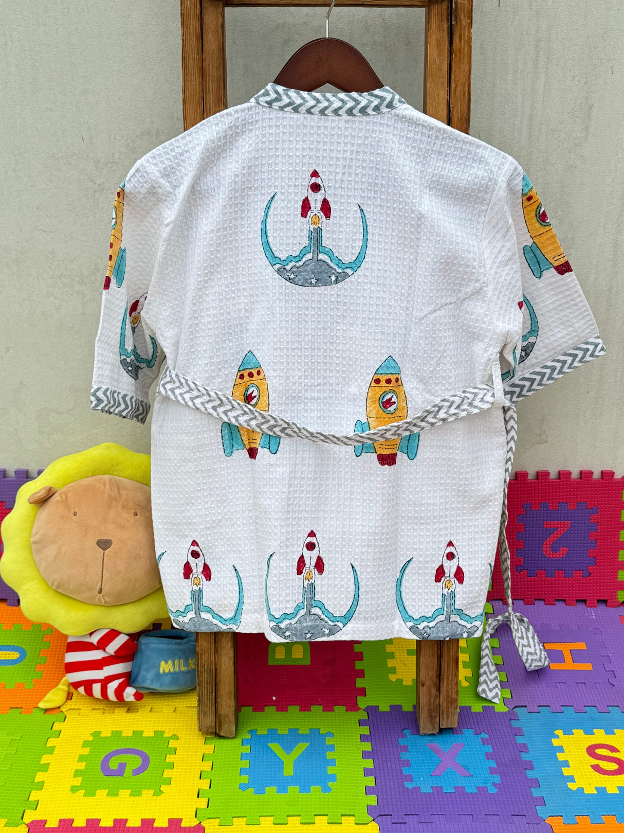 bulk order waffle cotton kids bathrobe with rocket design and custom name embroidery exported to uk usa and singapore