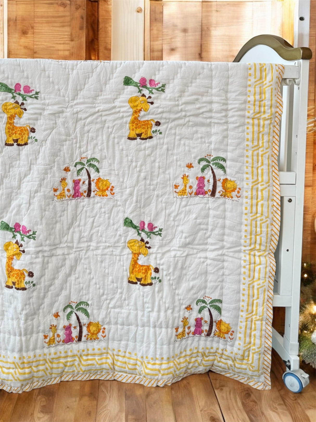 eco friendly cotton baby quilt with jungle safari theme including giraffes elephants and monkeys ideal for Indian moms in Australia and Singapore