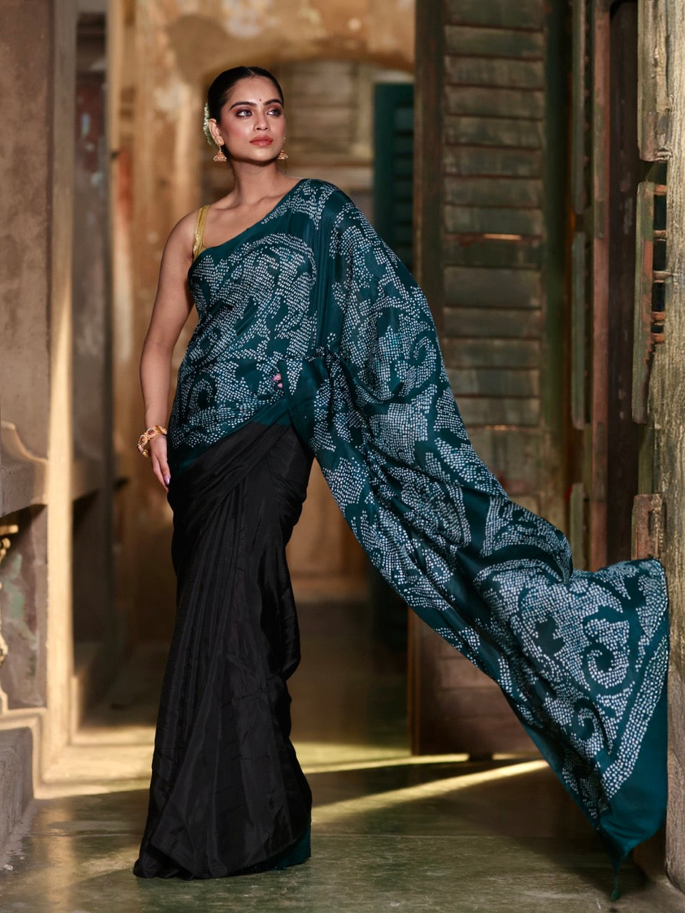 very-smart-and-stylish-habotai-silk-bandhani-saree-in-black-and-teal