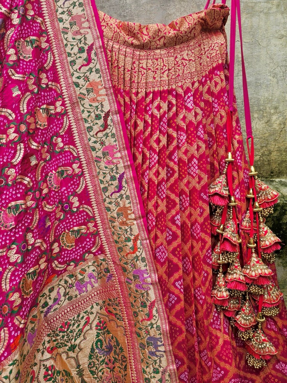 Vibrant Rani Pink Pure Banarsi georgette Bandhani Lehenga with Meenakari Dupatta
