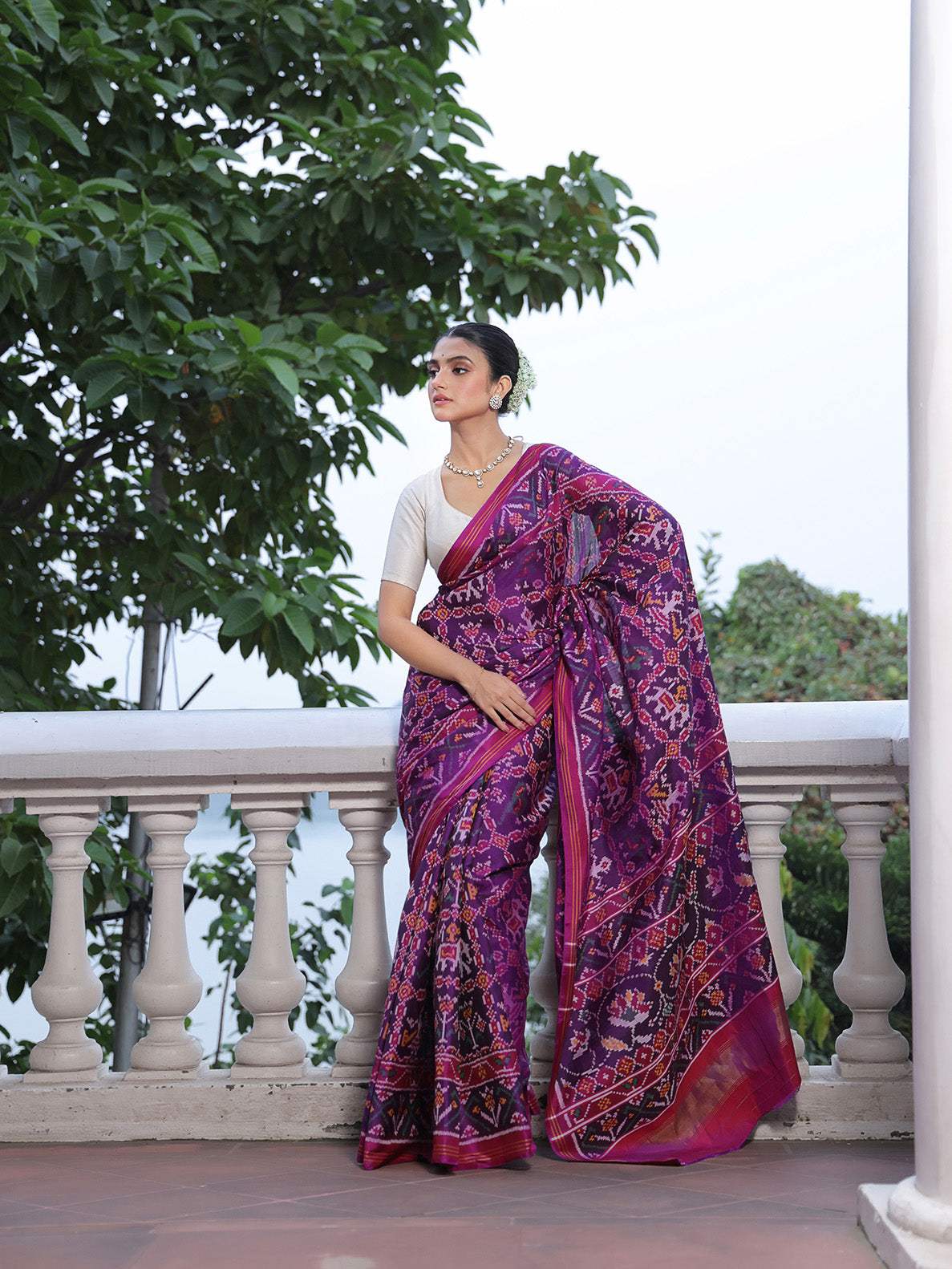 Distinct Handloom Violet and Pink Mulberry Silk Ikat Patola Saree with Nari Kunjar Pattern