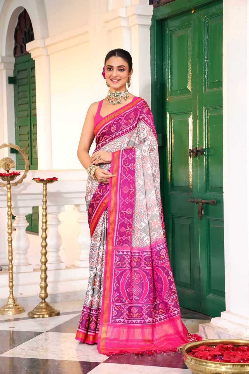 Timeless Handloom White and Pink Mulberry Silk Ikat Patola Saree with Intricate Navratna Motif