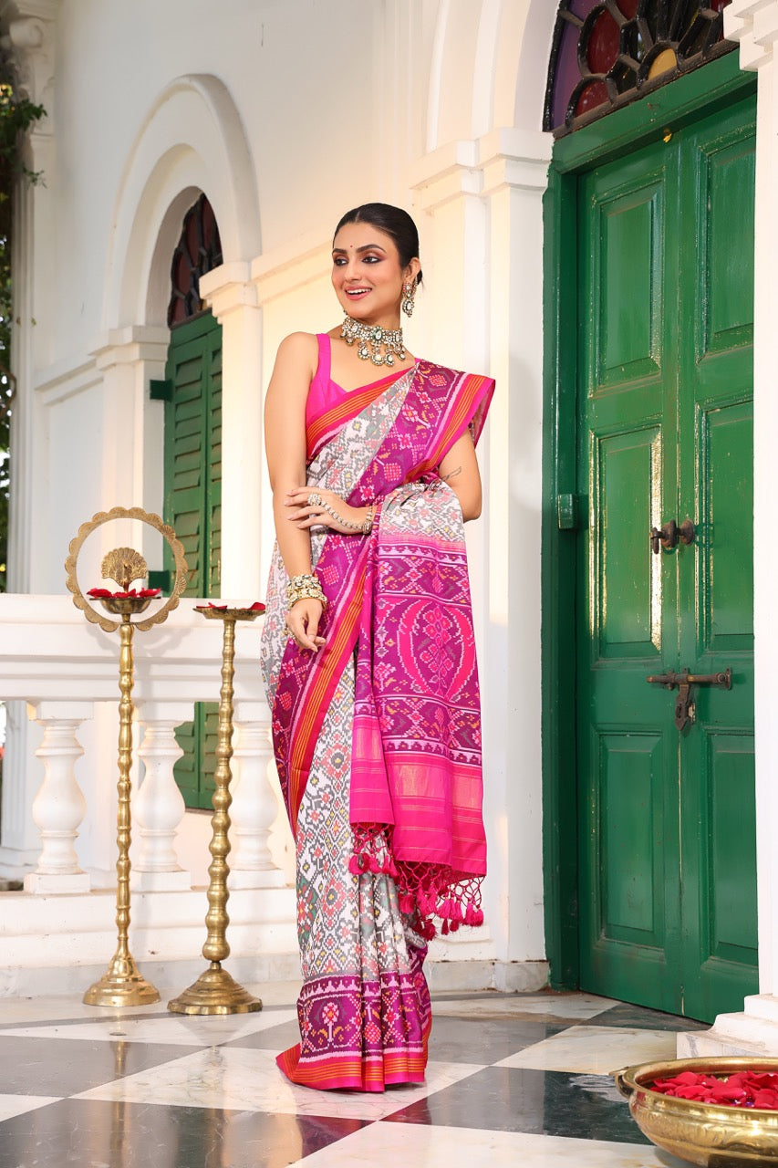 Timeless Handloom White and Pink Mulberry Silk Ikat Patola Saree with Intricate Navratna Motif